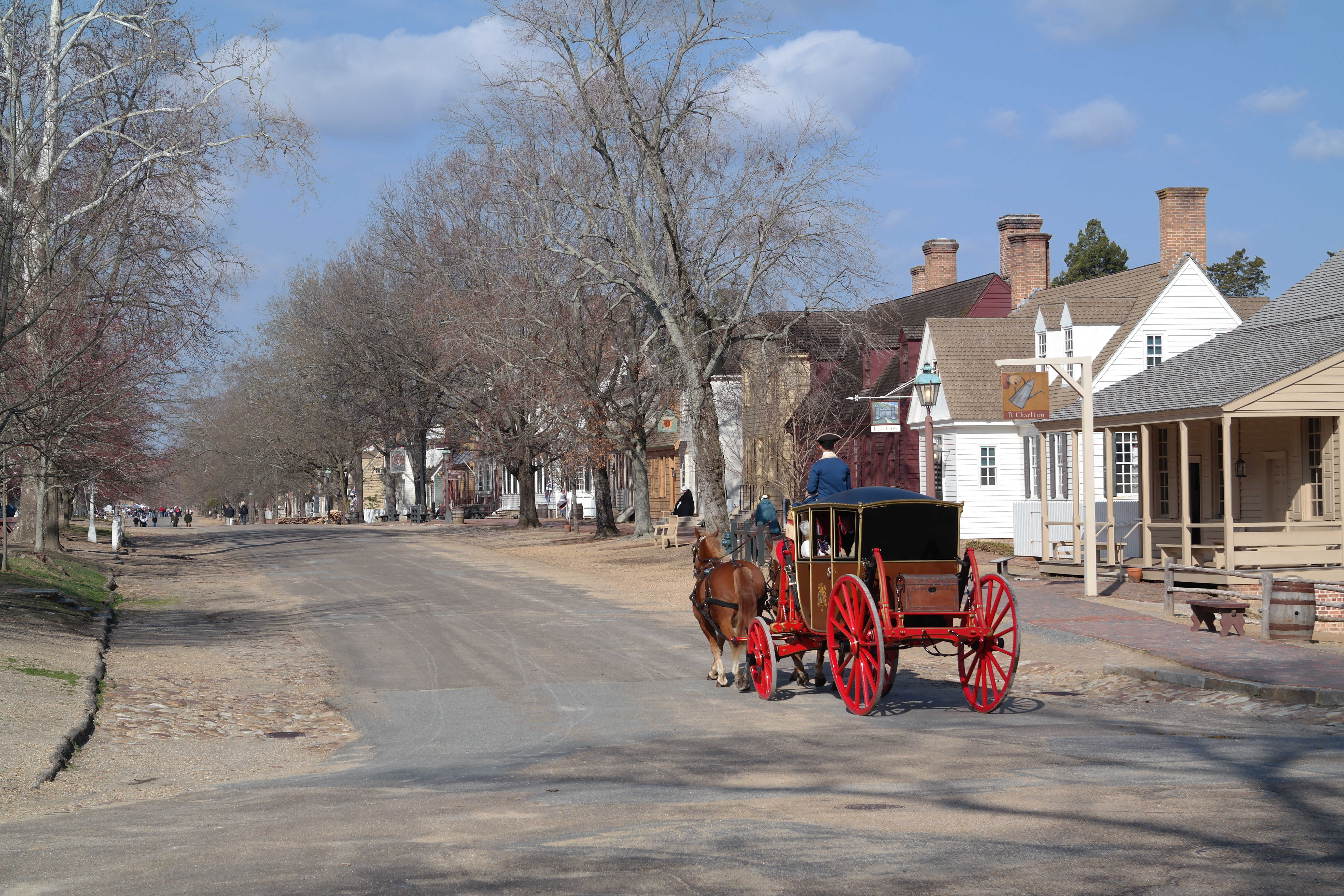 A horse-drawn carriage on Duke of Gloucester Street in Colonial Williamsburg.